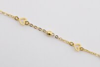 Zlatý náramok so srdiečkami a guľôčkami