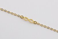 Náramok so symbolom nekonečno v žltom zlate