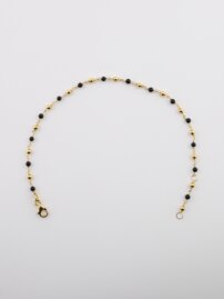 Elegantný náramok  so žltými a čiernymi guľôčkami