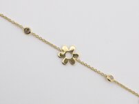 Náramok Au s kvietkom a dvoma kamienkami