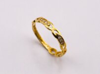 Prepletaný prsteň zo žltého zlata