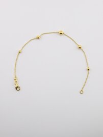 Zlatý náramok guľôčky