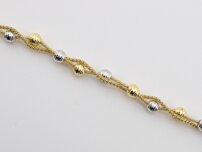 Prepletený náramok zo zlata s gulôčkami