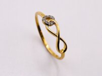 Dámsky zlatý prsteň nekonečno so zirkónmi