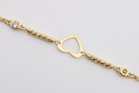 Zlatý náramok srdiečko s kuličkami a kamienkom