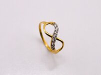 Dámsky zlatý prsteň nekonečno 14K – žlté zlato so zirkónmi