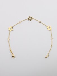 Náramok Au s kvietkom a dvoma kamienkami