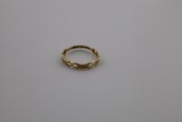 Prepletaný prsteň zo žltého zlata